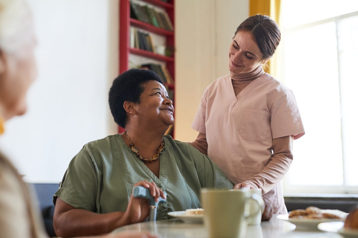 Smiling Senior Woman in Nursing Home